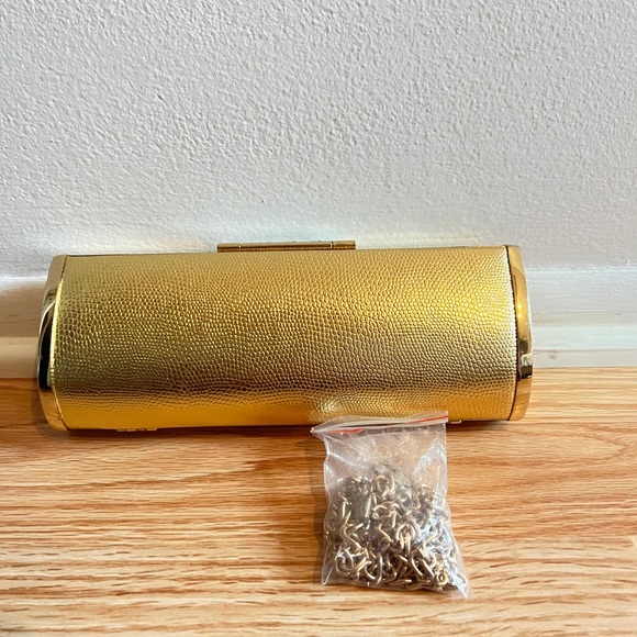 Gold clutch with a flap buckle - Picture 3 of 4